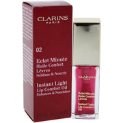 Clarins Instant Light Lip Comfort Oil 02 Raspberry 7ml - Maison des fragrances