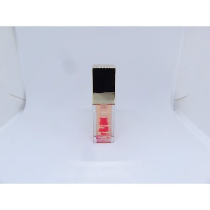 CLARINS Lip Comfort Oil 04 Candy 7ml 0.1 Oz. - Maison des fragrances
