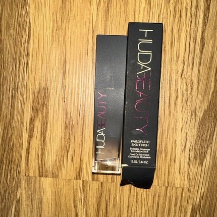 HUDA BEAUTY Fauxfilter Skin Finish Foundation Stick 220N Custard Authentic - Maison des fragrances